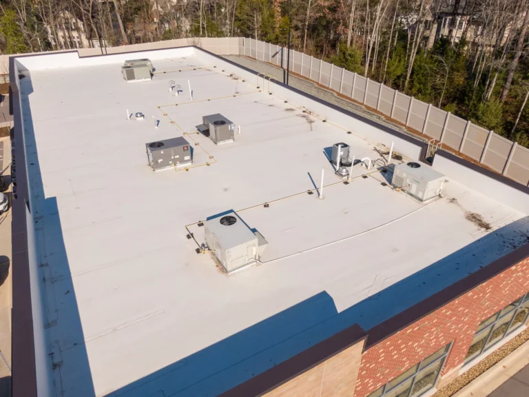 Flat TPO commercial roof with HVAC units