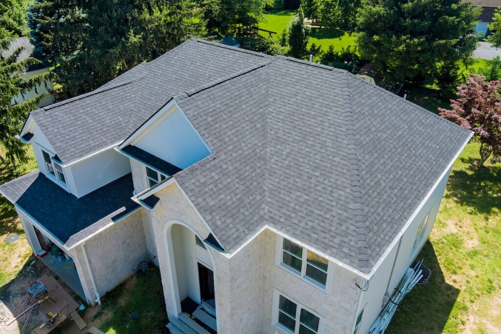 new shingle roof on large family home