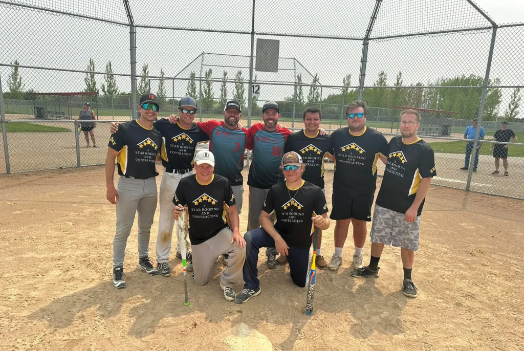 Fargo roofing team building event on the baseball field.