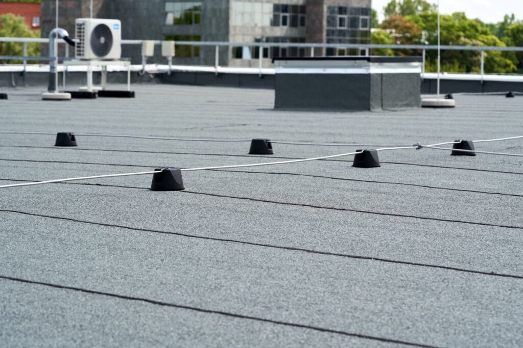 commercial flat roof light grey asphalt
