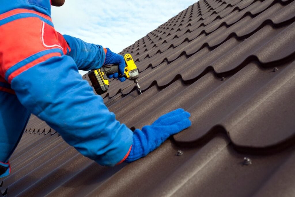 metal roof installation worker maintenance tiles