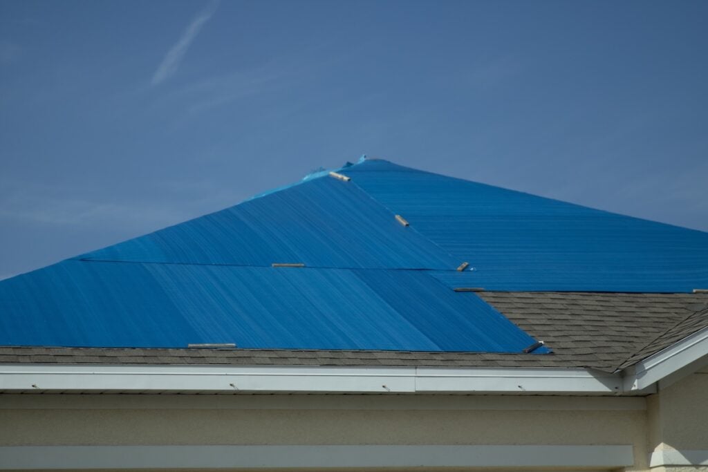Tarp over the roof
