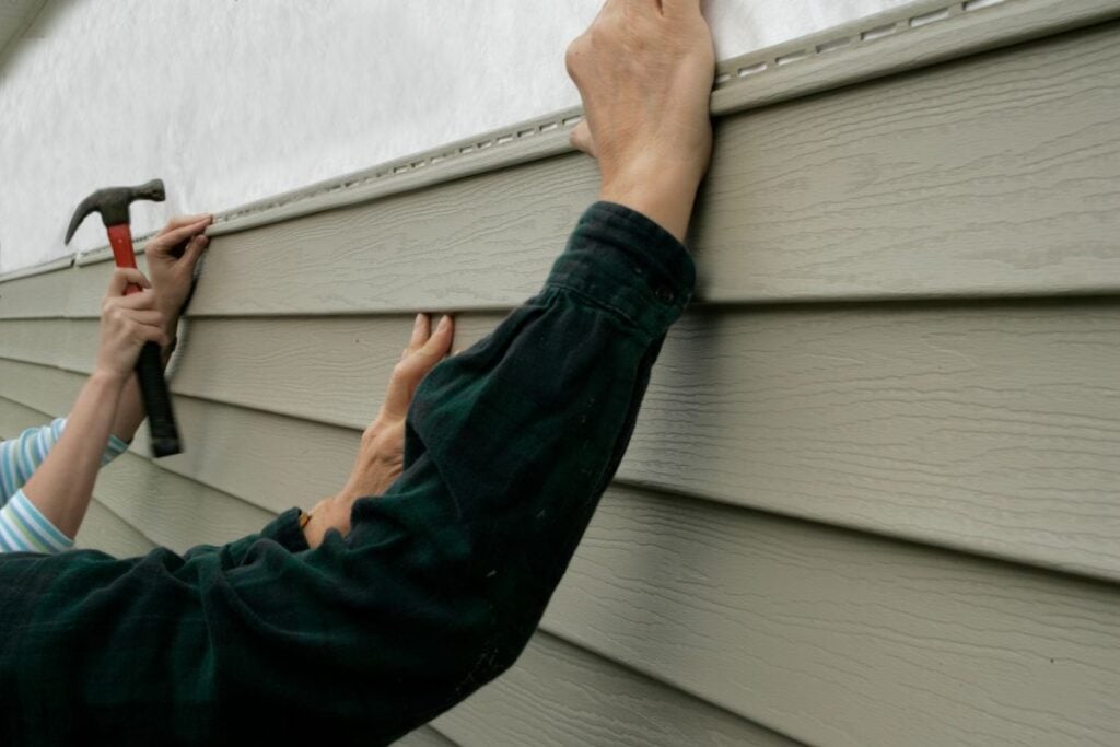 installing siding on a house