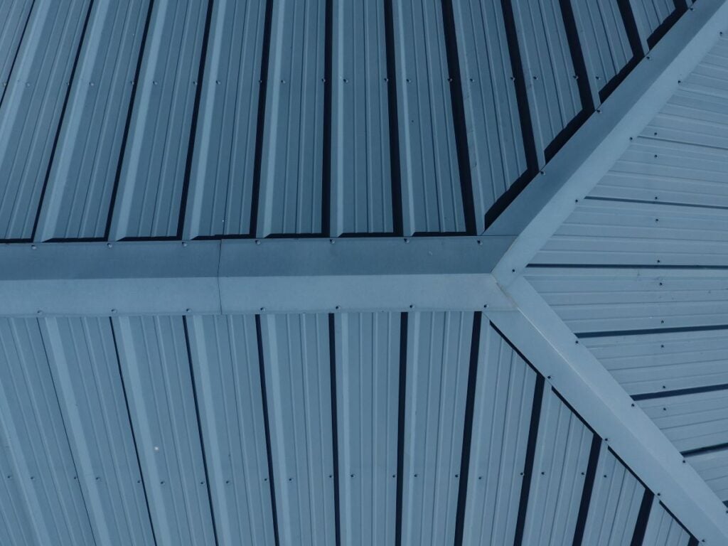 aerial view of a blue metal roof