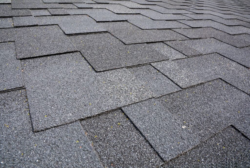 Close up view on Asphalt Roofing Shingles Background